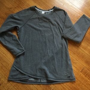 New Balance lightweight fleece tulip-hem shirt
